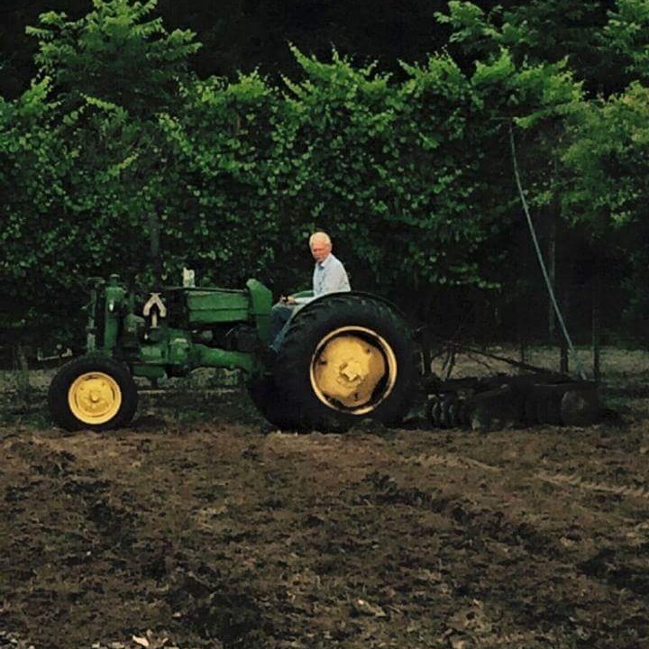 Pastor Frankie Godsey tending his farm in Milton, Florida.